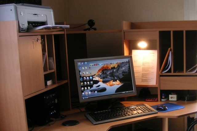 corner desk with computer