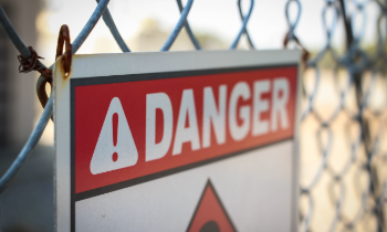 danger sign on wire fence