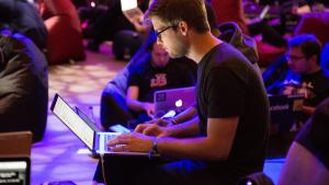 Man typing on a laptop